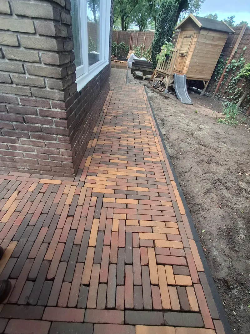Straatwerk rondom het huis Ede - Detail bestrating